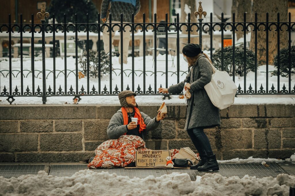 All about personal values examples: A woman helping a Begger.